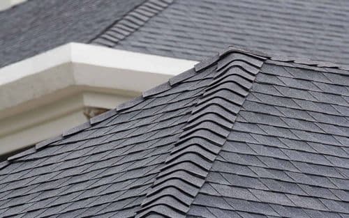 Close-up of architectural asphalt shingles on a Fort Worth residential roof
