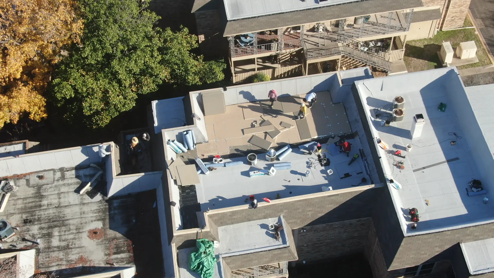 Aerial view of commercial flat roof installation - Arlington TX commercial roofing by City Roofing Company