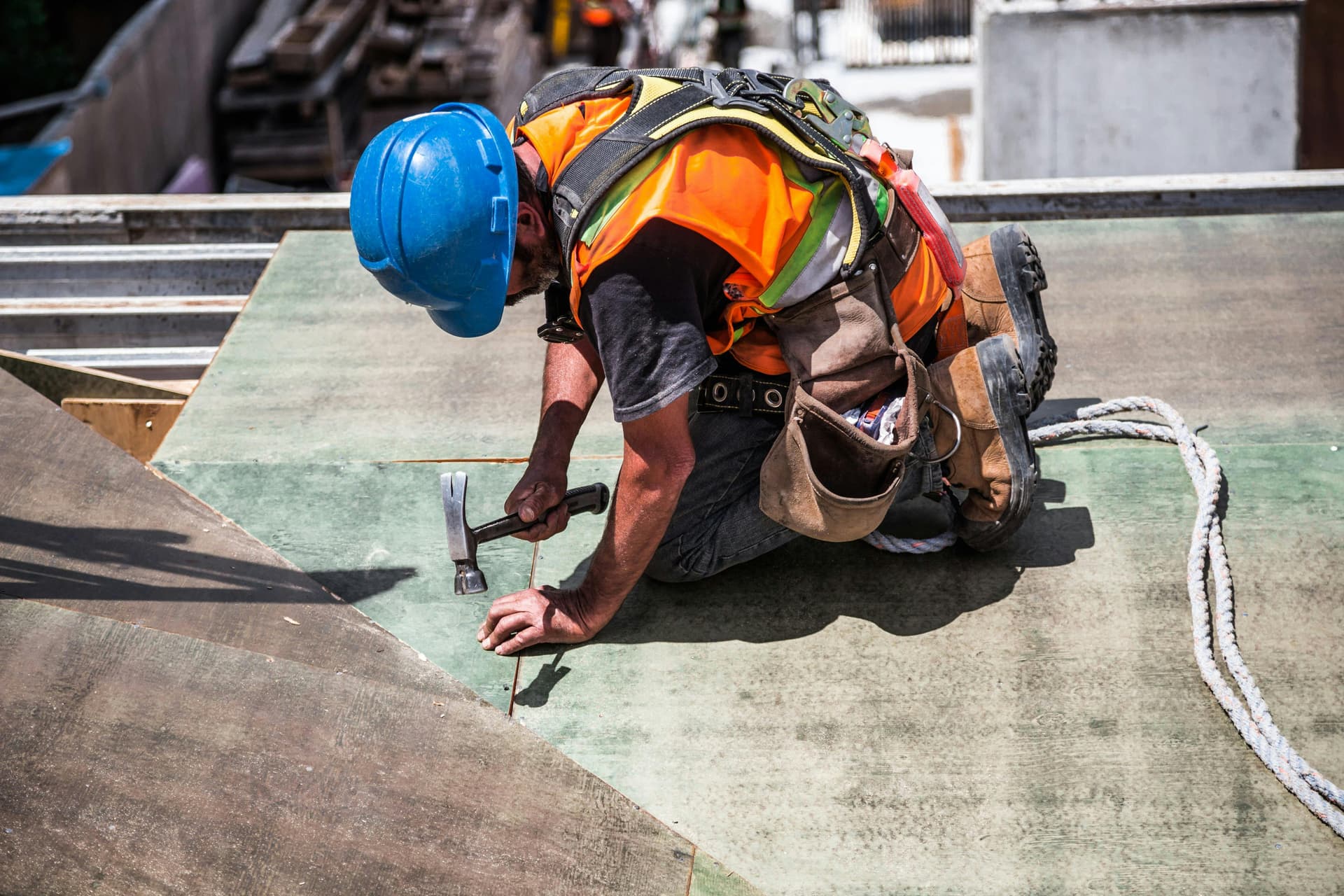 Roofer performing repairs on Arlington TX residential roof