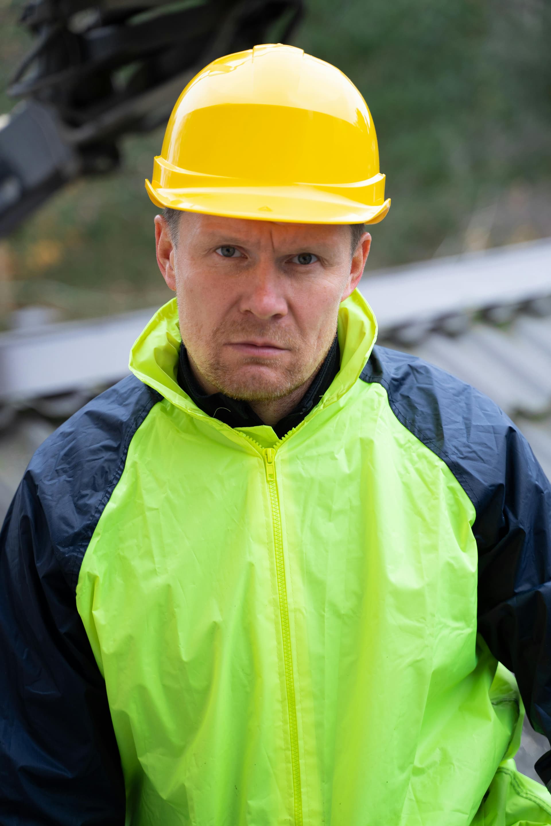 Professional roofer inspecting a Fort Worth commercial roof under a maintenance agreement